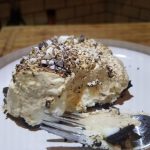 Rich and creamy rum laced Tiramisu Pie with chocolate espresso crust.