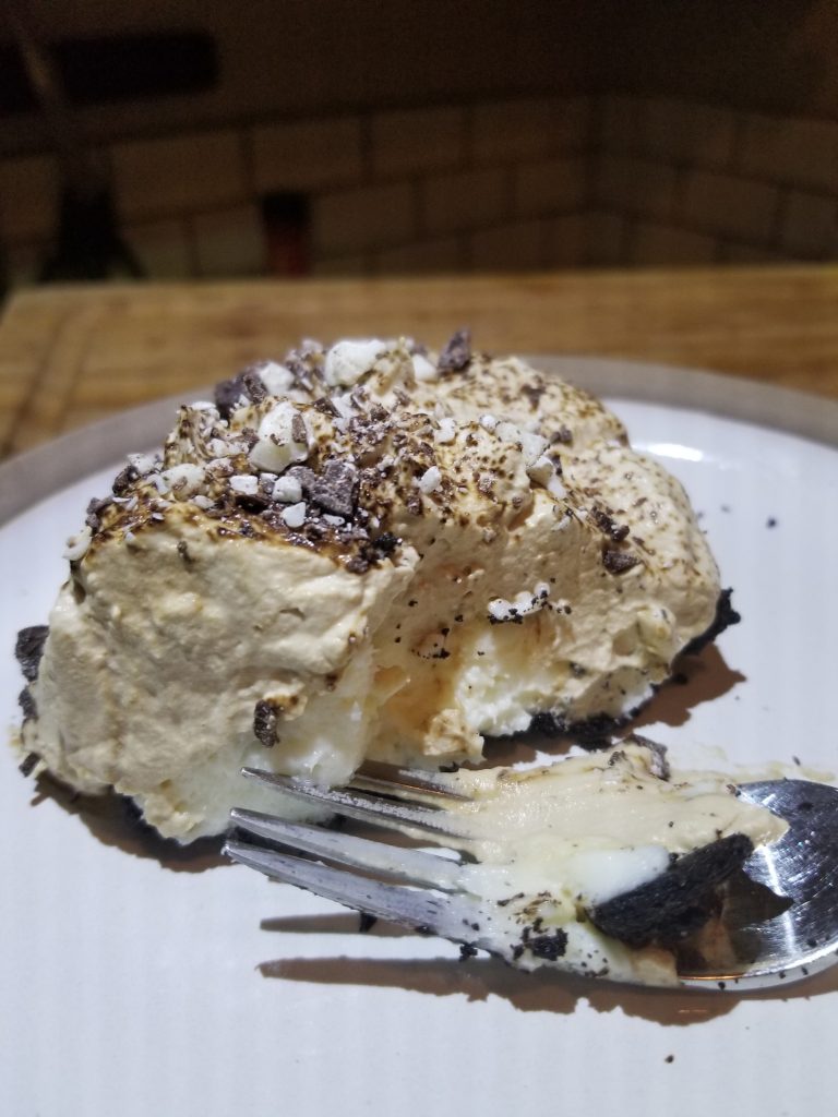 Rich and creamy rum laced Tiramisu Pie with chocolate espresso crust.