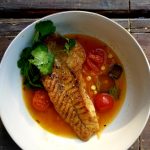 Lightly coated snapper in a spicy tomato broth
