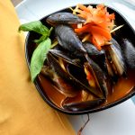 Penn Cove mussels get steamed in a coconut red curry broth
