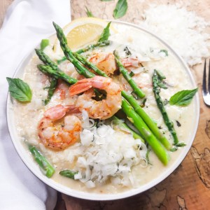 Creamy Shrimp and Asparagus Risotto is easy to make with Arborio rice, sautéed shallot, white wine and simmered broth.