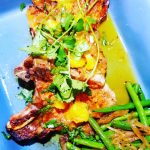 Grilled pork chops in a zesty jalapeno orange sauce