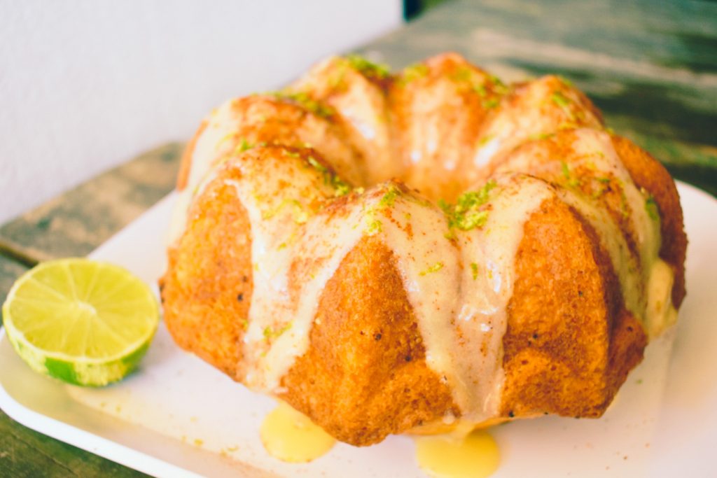 Inspired by my favorite Mexican candy, this buttery yellow cake is topped with sweet mango glaze and spicy chili-lime