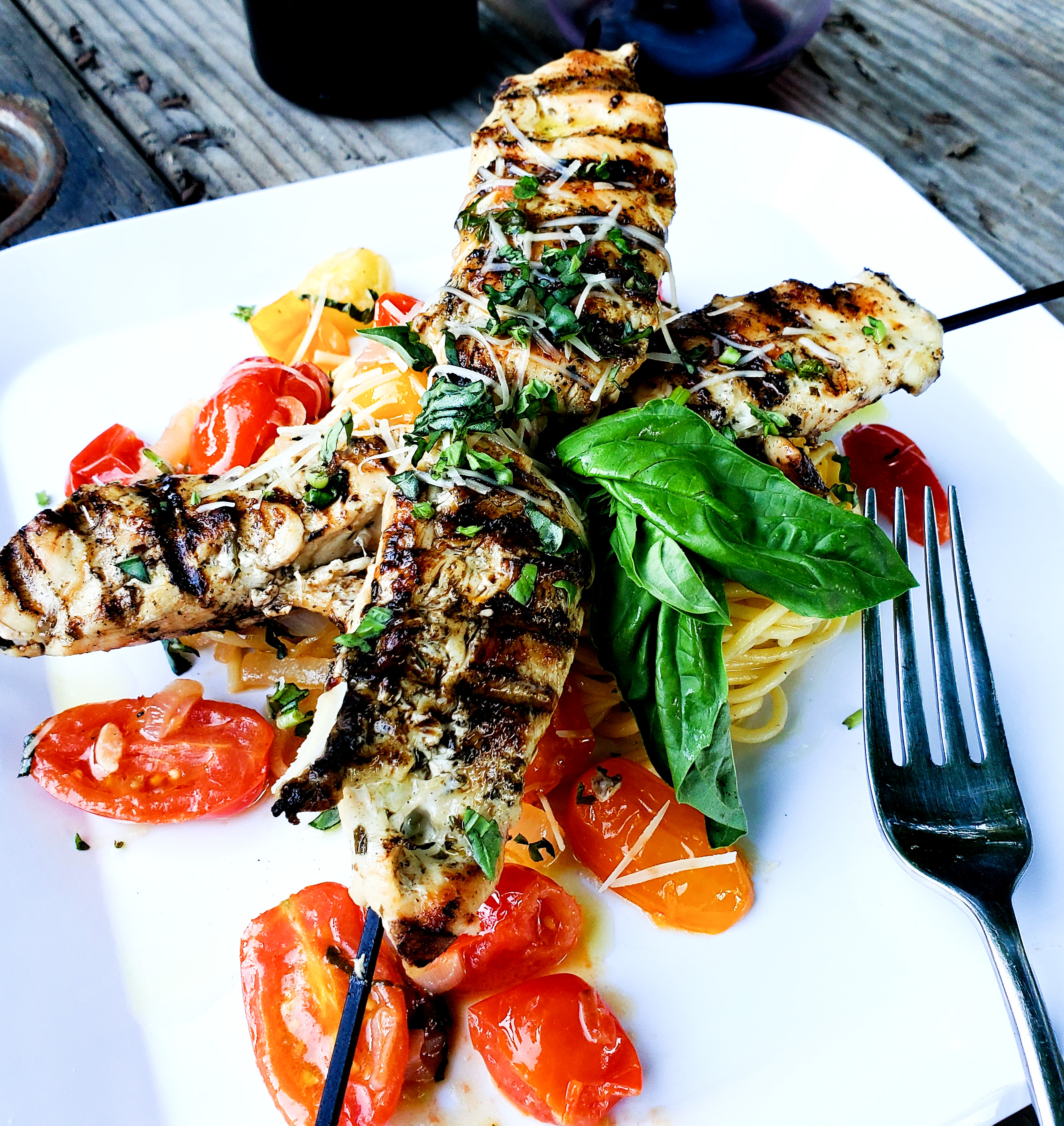 Quick & Easy Grilled Chicken Pesto Kabobs pair perfectly with summery blistered tomato spaghetti.