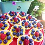 Sweet and tart lemon curd in a graham cracker crust with fresh blueberries and raspberries