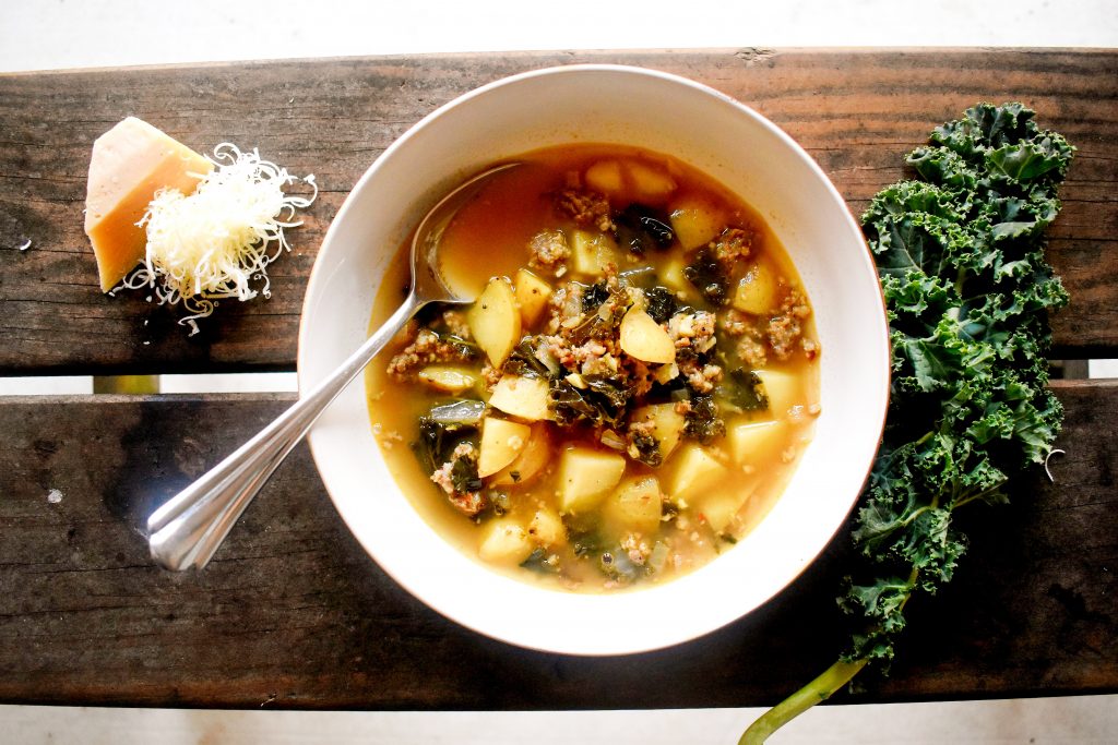 Portuguese green soup, Caldo Verde, delivers soul warming goodness with simple ingredients of potato, spicy sausage and kale. This broth based soup is perfect for the first crisp days of fall.
