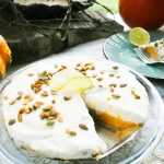 A perfect twist on the traditional, this Pumpkin Cream Pie with Chili Lime Pepitas combines layers of pumpkin and whipped cream over a graham cracker crust.