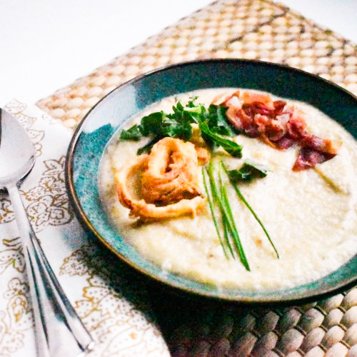 Roasting parsnips brings out their earthy sweet flavor in this winter soup. Not only is this soup easy to make, it's easy on the budget too.