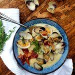This rustic, Farm Style Clam Chowder combines fresh manila clams, sliced baby potatoes, a splash of sherry, cream, tarragon and smokey bacon.