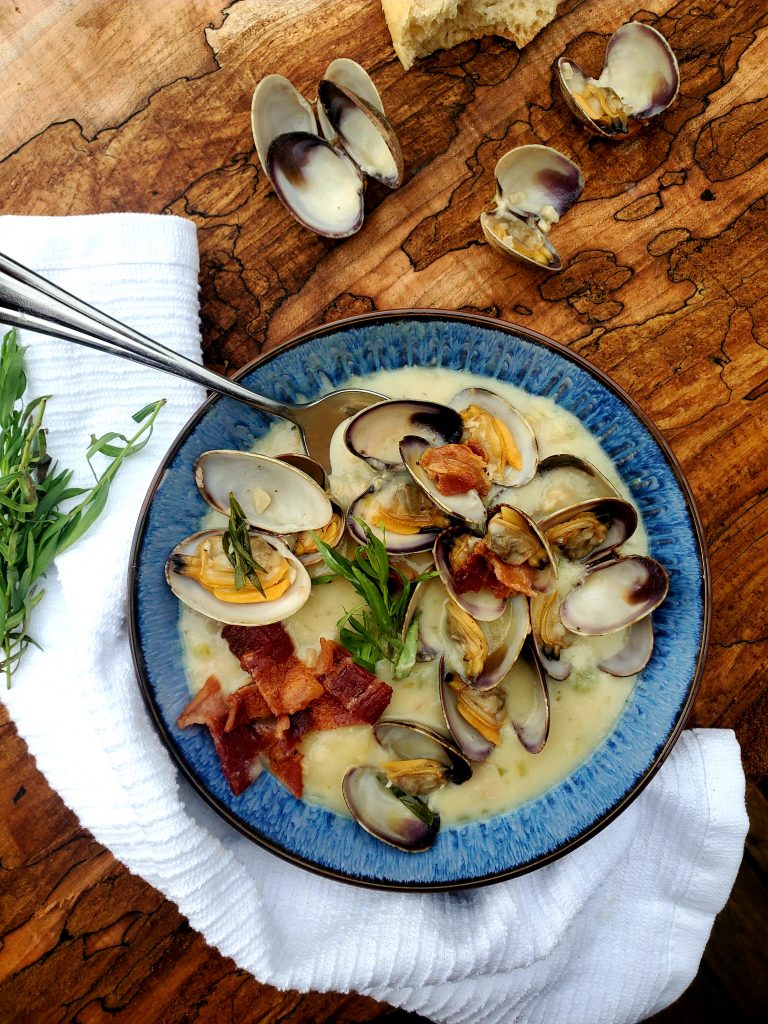 This rustic, Farm Style Clam Chowder combines fresh manila clams, sliced baby potatoes, a splash of sherry, cream, tarragon and smokey bacon.