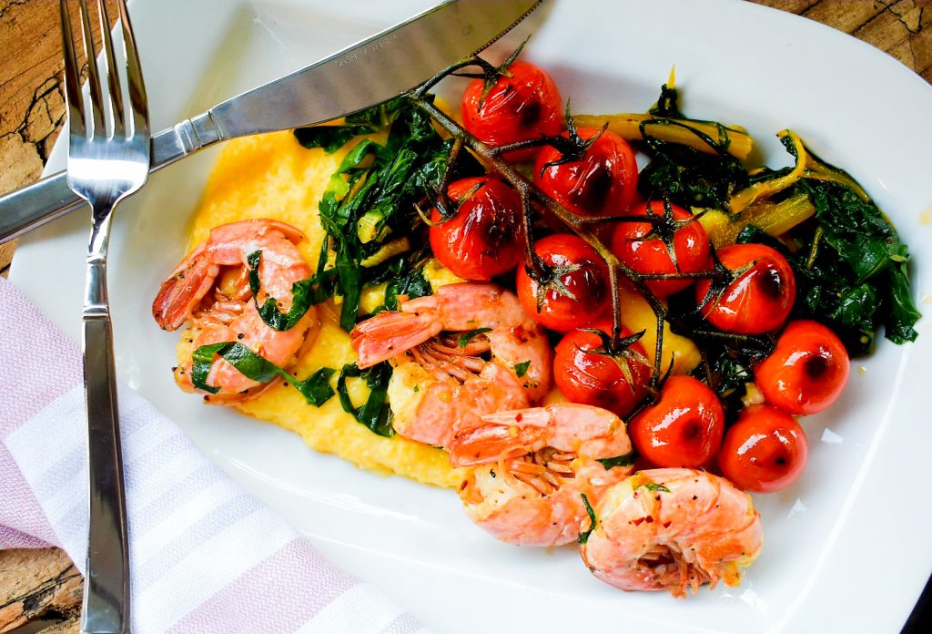 Sauteed prawns, vine tomatoes, garlic and Swiss chard