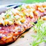 Grilled salmon with fresh corn, cilantro and cotija cheese