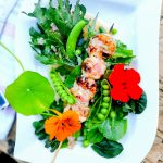 Buttery grilled scallops, smoked citrus shallot field greens