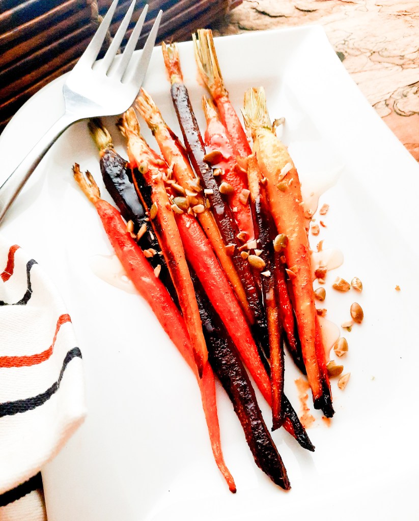 An easy side dish full of flavor, Roasted Spiced Carrots with Agave and Pepitas bring rustic elegance to your table.