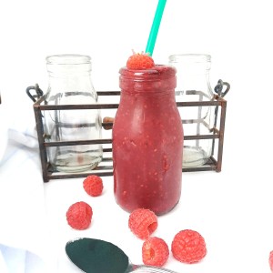 Spirulina Pomegranate Raspberry Smoothie combines three powerful anti-oxidants along with vitamins and minerals for a healthy drink.