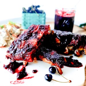 Sweet and smoky Chipotle Cherry Spare Ribs are slow cooked with a dry rub, then finished in the most delicious farm fresh cherry sauce.