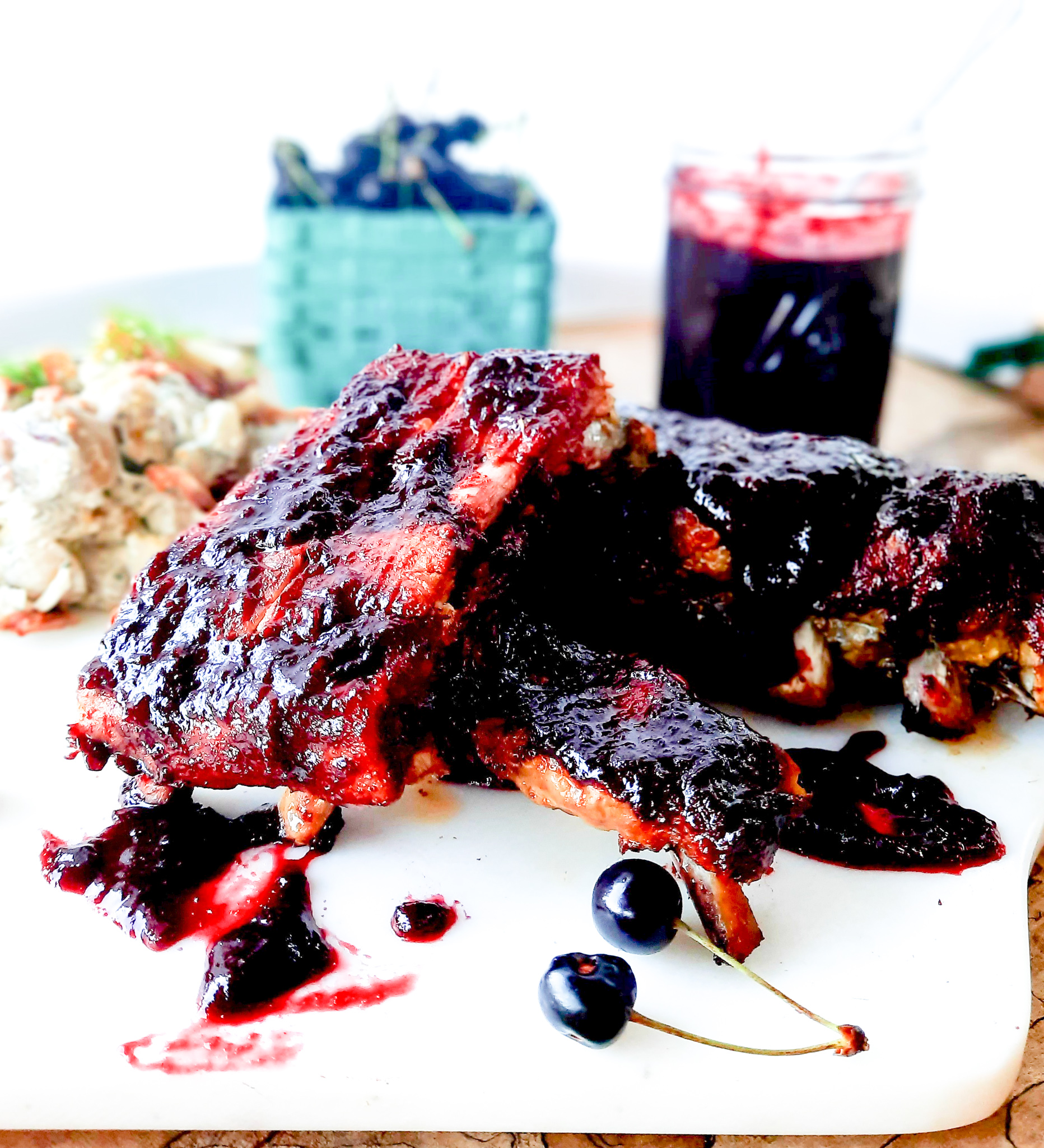 Sweet and smoky Chipotle Cherry Spare Ribs are slow cooked with a dry rub, then finished in the most delicious farm fresh cherry sauce.