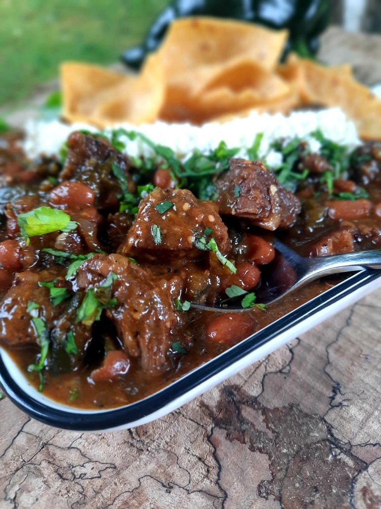 Out West Cowboy Steak Chili combines tender steak, pinto beans and poblano chili peppers for a hearty meal with a subtle campfire cooked taste.  