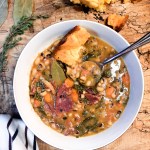 Black Eyed Pea Soup with smoked ham and collard greens in a flavorful broth.