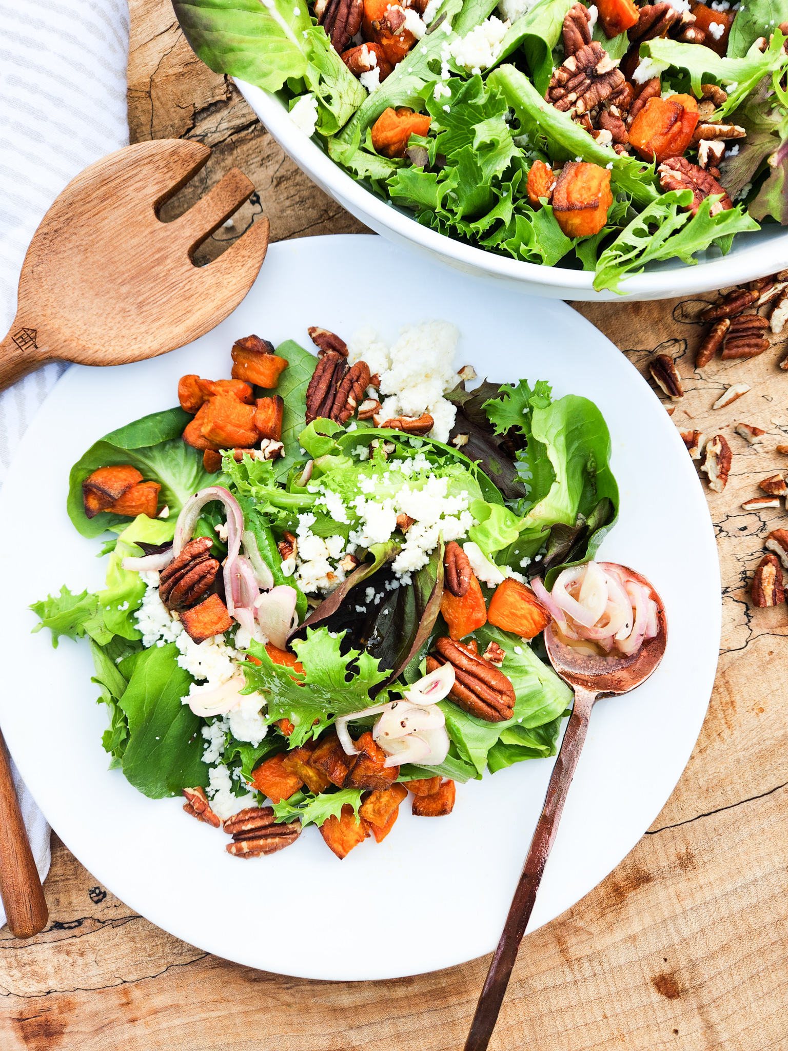 Fall Salad with Pecans, Yams and Cotija celebrates the earthiness of roasted garnet yams, toasted pecans, crumbled Cotija cheese and greens.
