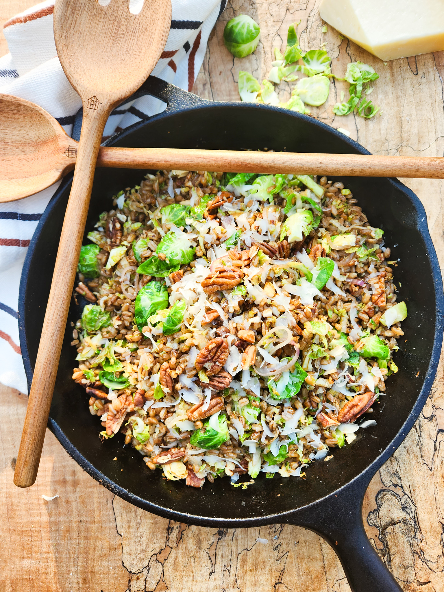 Farro, Brussels Sprouts and Pecan Salad lightly fried with thinly sliced shallot, shaved parmesan and balsamic glaze.