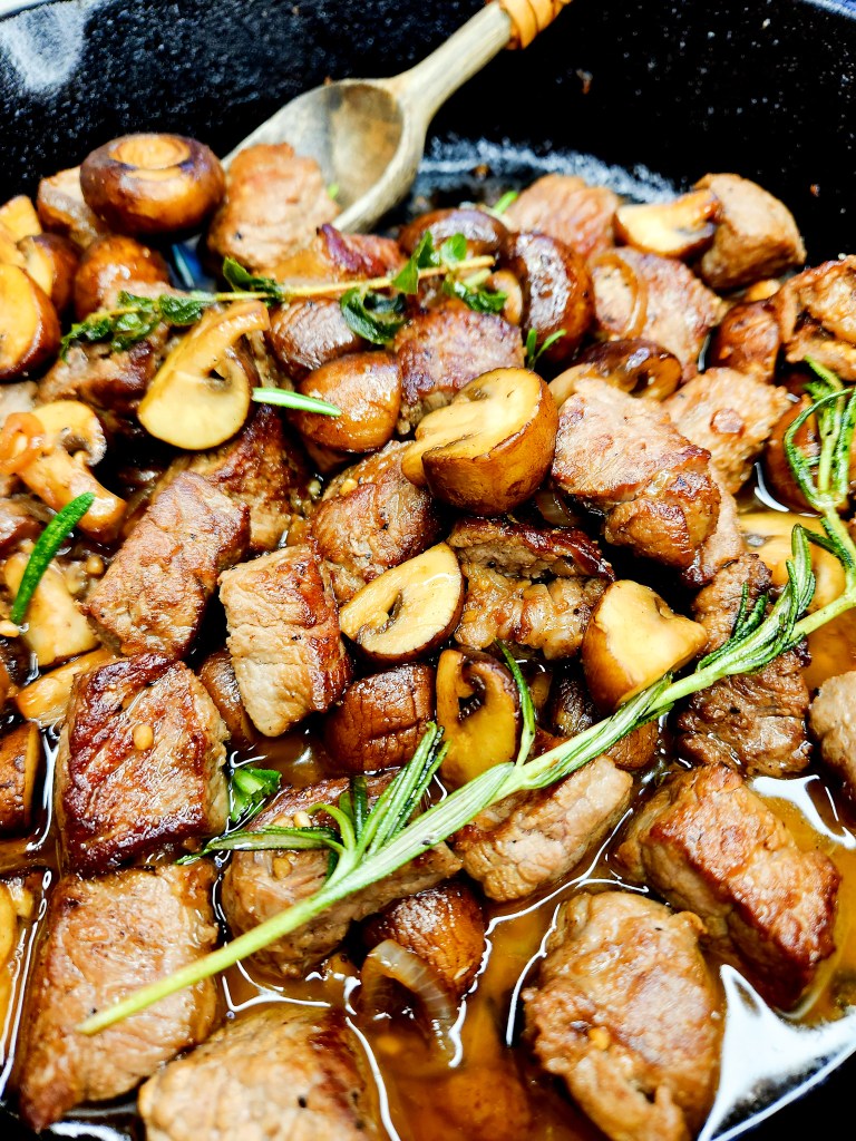 Steak Bites with Herby Mushrooms is a delicious one pan meal ready in less than 15 minutes with very few ingredients. 