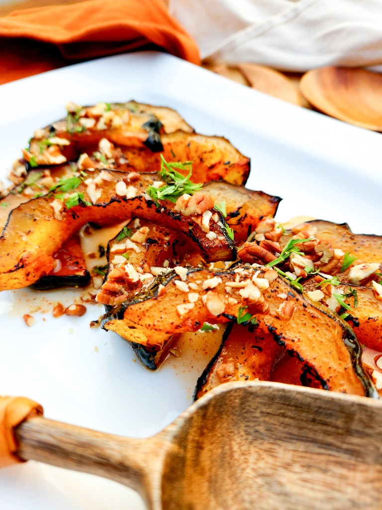 Spiced Acorn Squash roasted until tender, glazed with sweet agave, smoked paprika, chipotle and finished with toasted pecans.