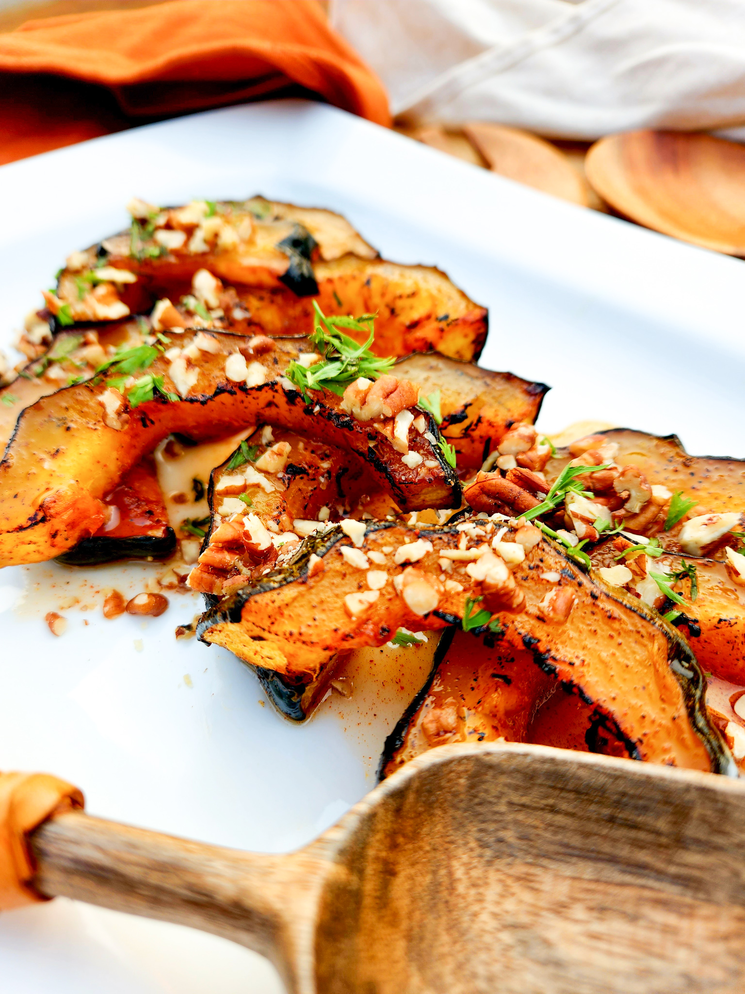 Spiced Acorn Squash roasted until tender, glazed with sweet agave, smoked paprika, chipotle and finished with toasted pecans.