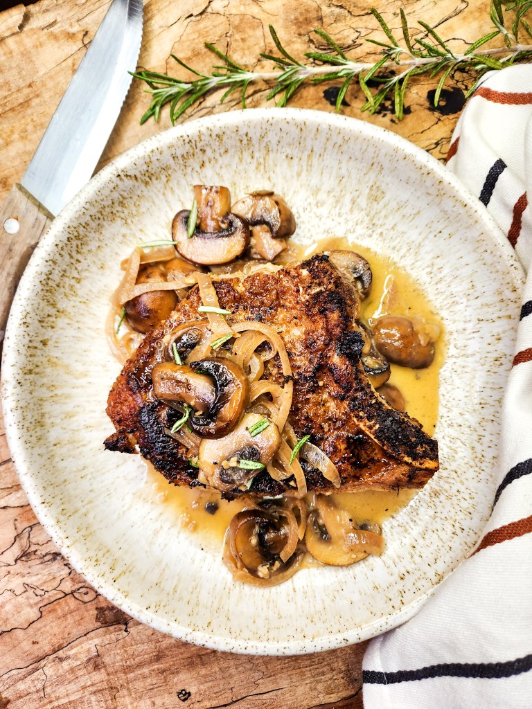 Pork Chops with Mushroom Sauce is an easy weeknight meal with seared chops and a flavorful mushroom sauce with shallot, sherry and butter