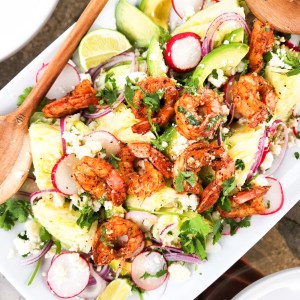 Mexican Shrimp Mini Wedge Salad is perfect for sharing layered with spicy shrimp and drizzled in agave lime vinaigrette.