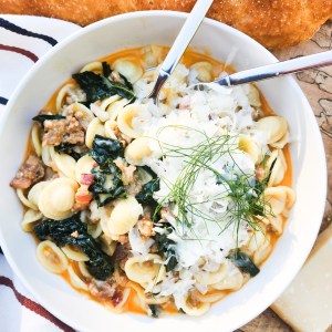 Orecchiette Pasta with Chorizo and Kale is creamy, saucy and packed with bits of bacon, shallot and freshly shaved parmesan.
