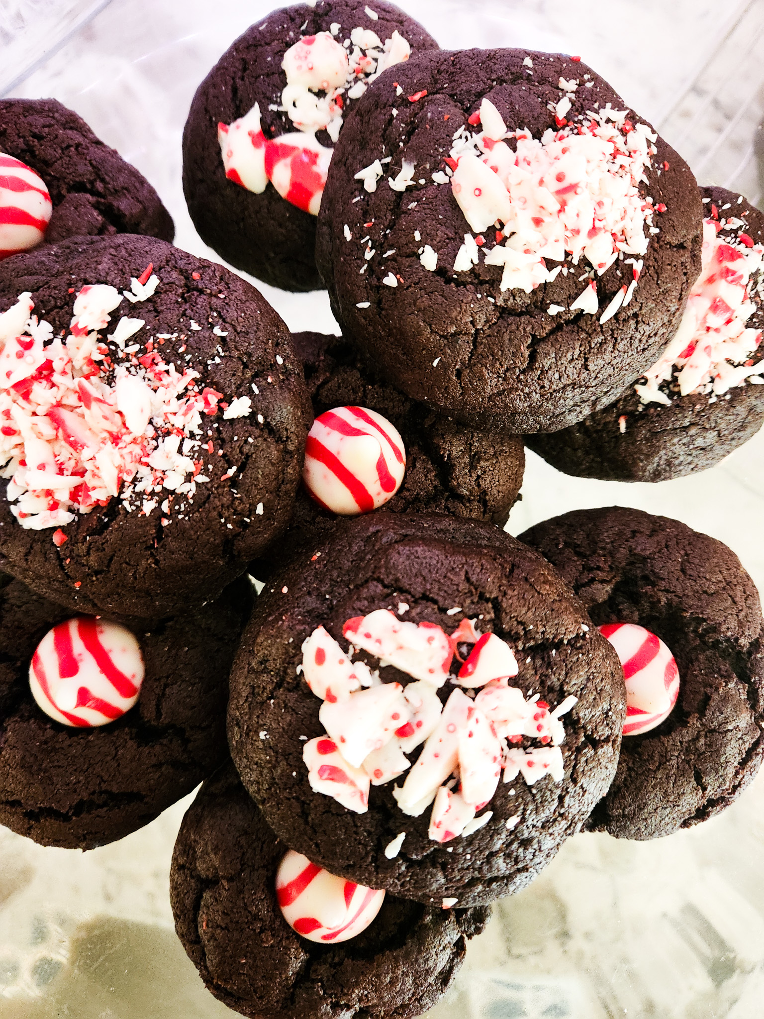 Peppermint Crunch Cookies are rich and chewy chocolate cookies topped with crunchy peppermint candies.