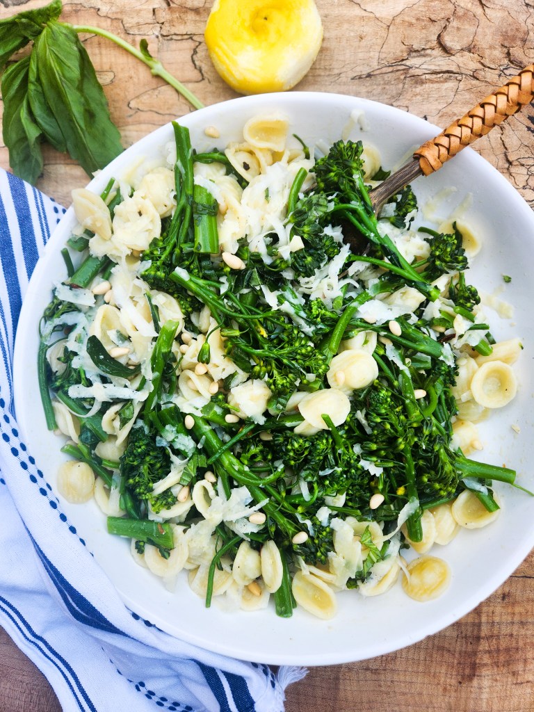 Orecchiette with Broccoli Rabe is an easy and flavorful dish accented with fresh basil, pine nuts and pecorino romano.