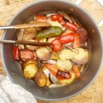 Country Style Potatoes are thick sliced yellow potatoes fried in bacon fat for an extra crispy crust with red pepper, jalapeno and onion.