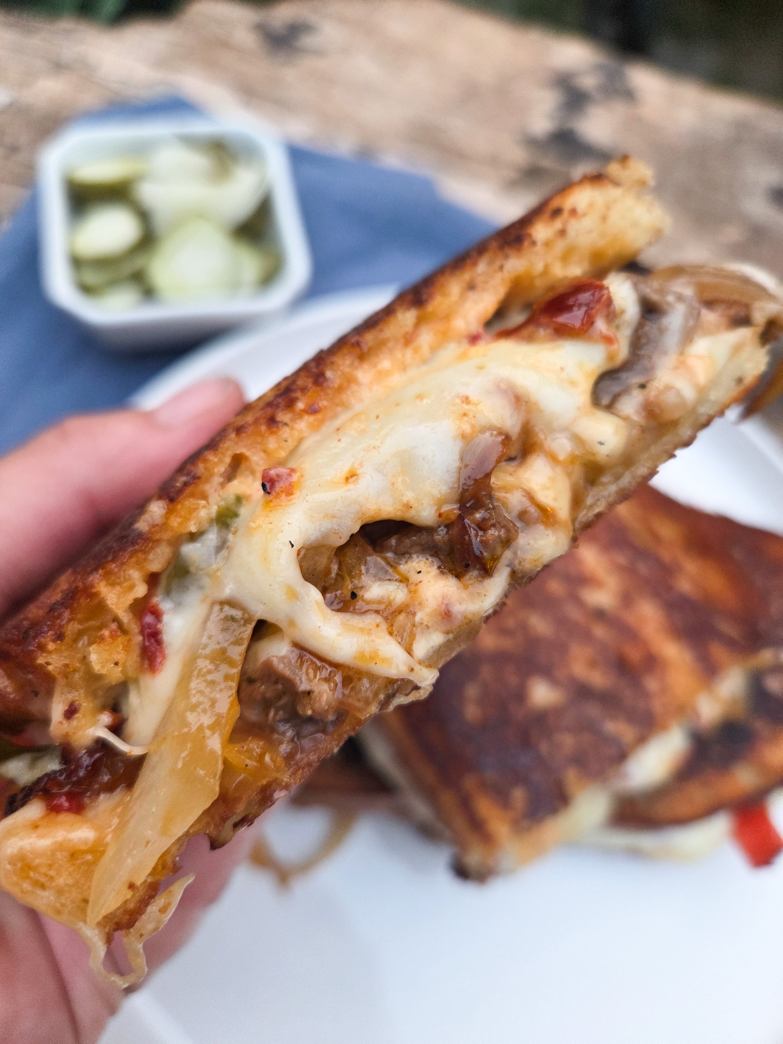 Grilled Steak Sandwich with sautรฉed onions, peppers and jalapenos, sliced grilled steak and melty provolone cheese with chipotle mayonnaise.