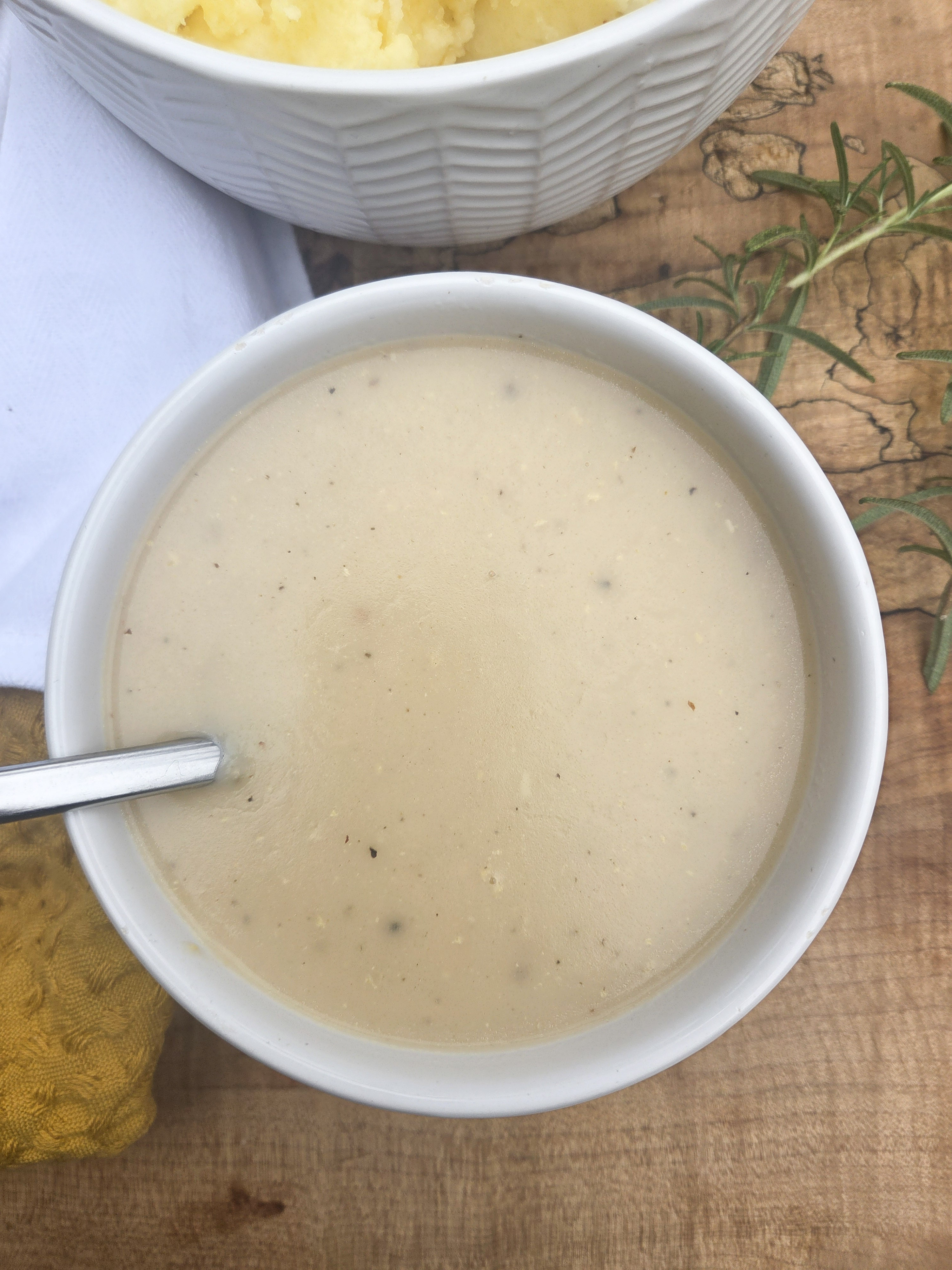 Classic Poultry Gravy is a staple at any holiday table made with turkey drippings or your favorite chicken broth.