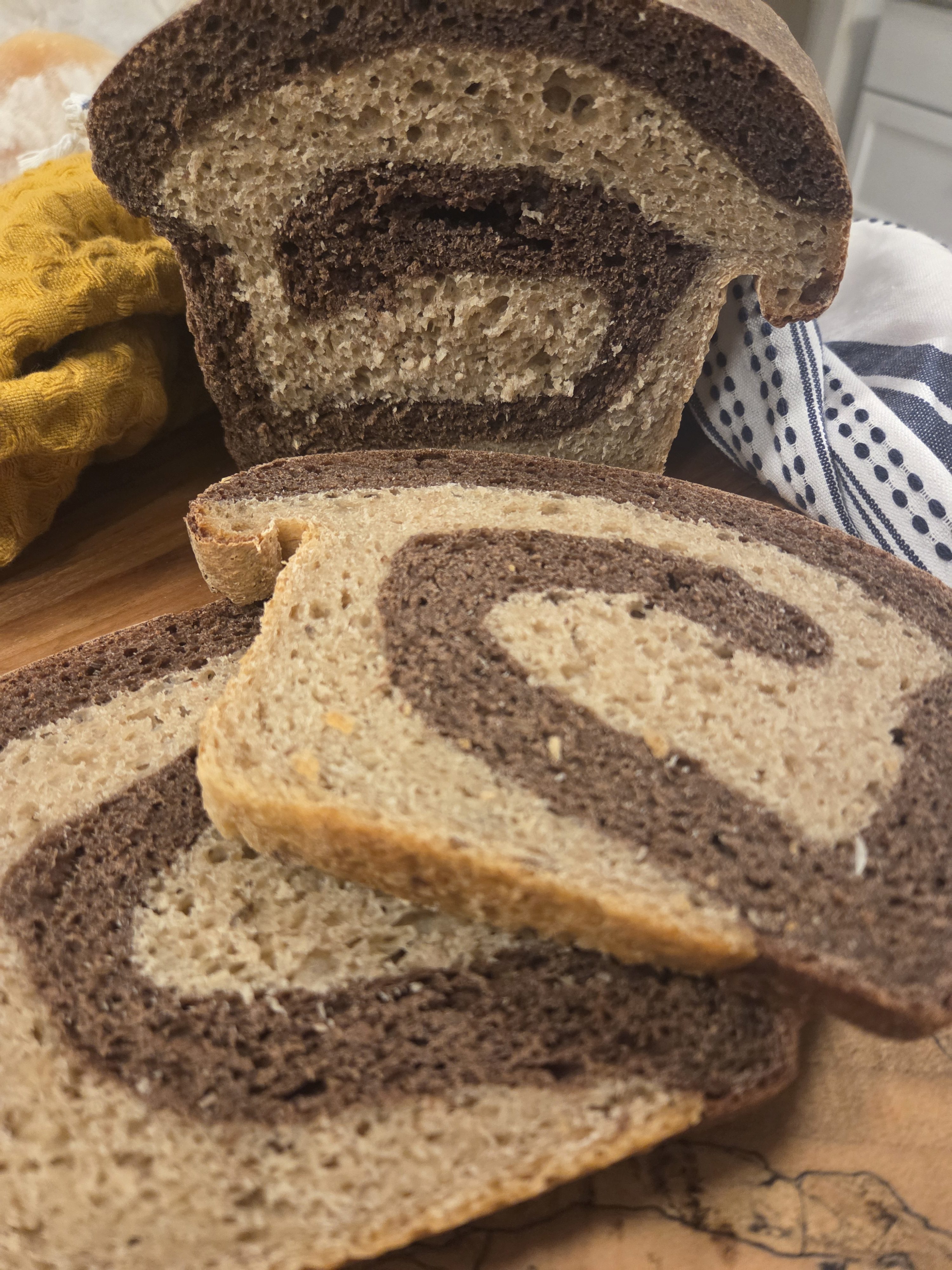 Marbled Sourdough Rye Bread is the best of both dark and light rye bread with sourdough layered and rolled together.