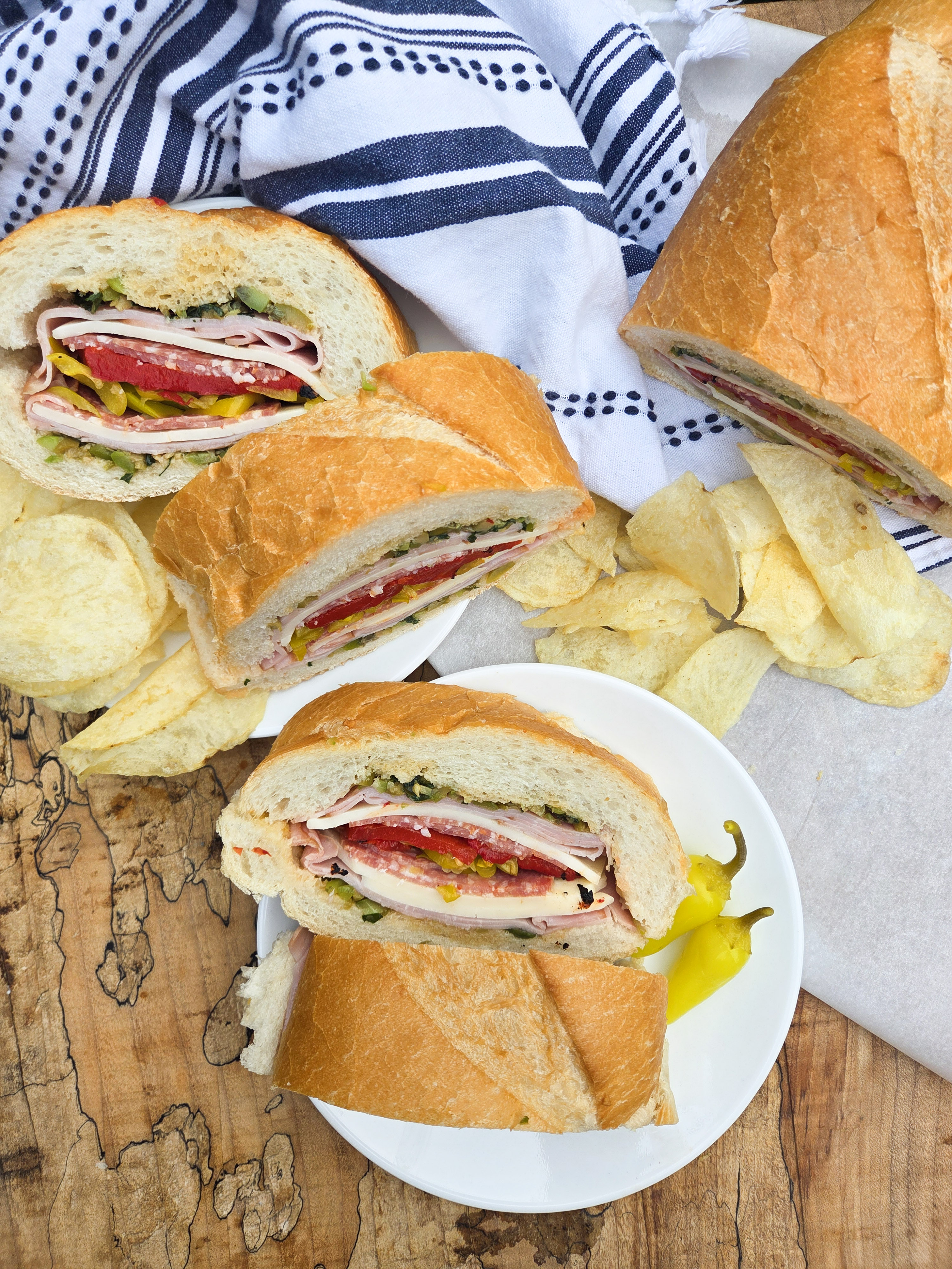 Bring bold New Orleans flavor anywhere! This easy Muffuletta Sandwich is the perfect make-ahead recipe for picnics, camping and beach days.