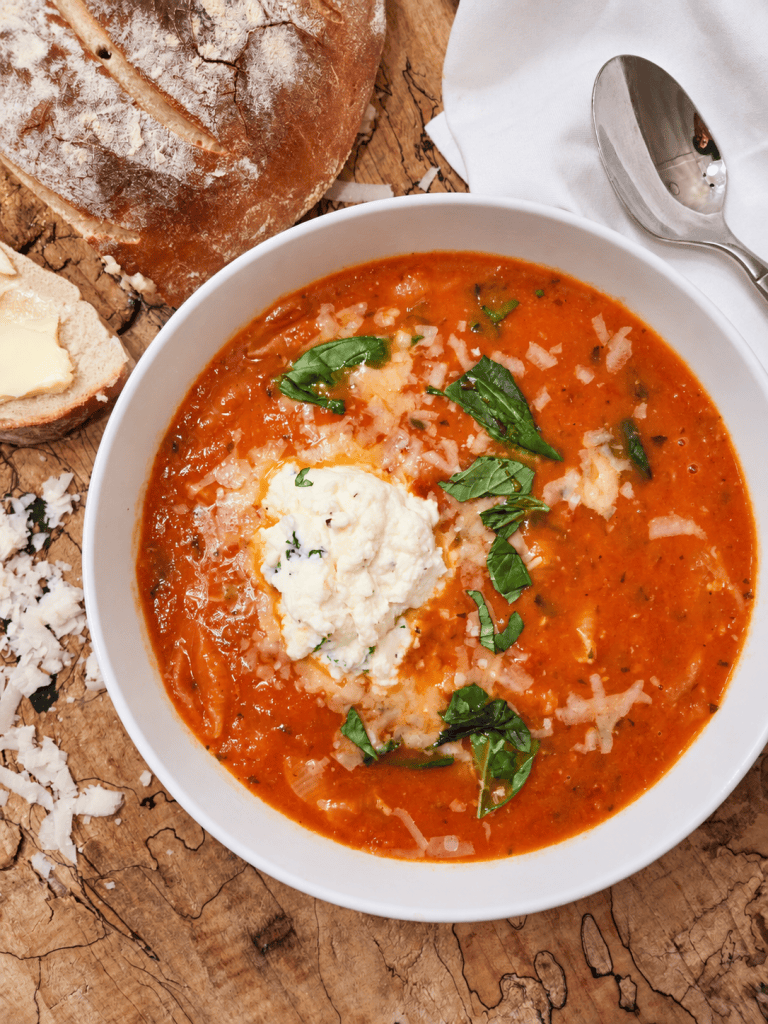 Comforting bowl of Creamy Stuffed Shell Soup with Herbed Ricotta 