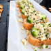 Cucumber bruschetta at The Lighthouse Bar & Restaurant with toasted rustic baguette, creamy dill spread, fresh cucumber slices, and crumbled feta cheese.